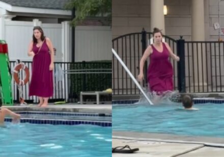 Mom fully clothed in pool trying to get son out of water